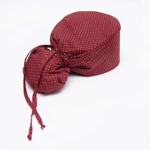 Medical/surgical cap for women made by Cotton Formula. Ponytail. The top and lining made out of 100% cotton fabric.