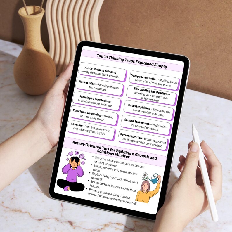 May include: A tablet displays a guide titled "Top 10 Thinking Traps Explained Simply." The guide lists cognitive distortions and offers action-oriented tips for building a growth mindset. The tablet is held by a person, with a stylus visible.