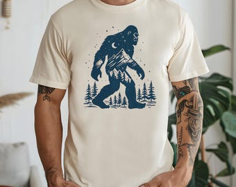 Bigfoot Graphic Tee Shirt Design Mountain Scene Sasquatch Outdoor Adventure Camping Gift for Him Dad Apparel Wilderness Lover Cryptid