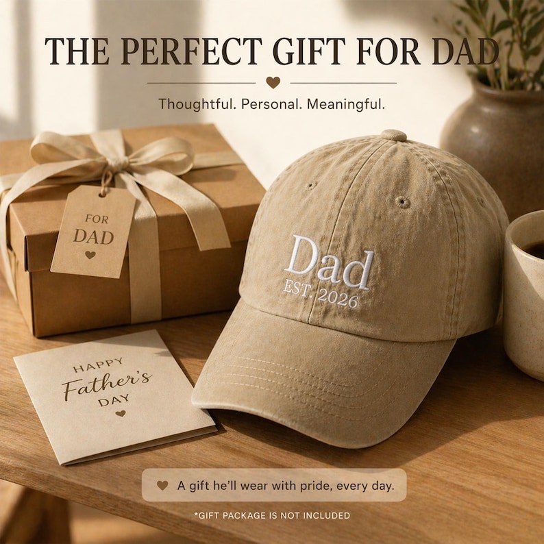 May include: A tan baseball cap with the word "Dad" embroidered in white, along with "EST. 2026". A gift box with a tag that says "For Dad" and a Father's Day card are also visible. The text reads "The Perfect Gift For Dad".