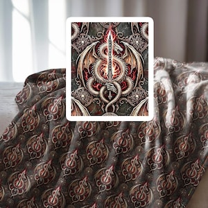 May include: A blanket with a repeating pattern of a dragon and a sword. The central image features a white dragon holding a flaming sword, set against a red and gray background. The blanket's overall color scheme is dark gray and red.