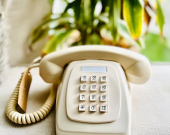 Vintage Herald Telephone in ivory color (original color) made of borons