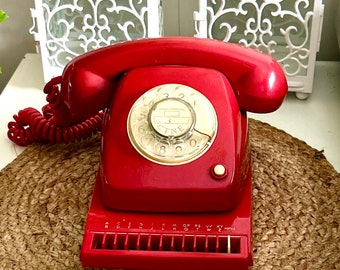 Telefono vintage rojo con agenda