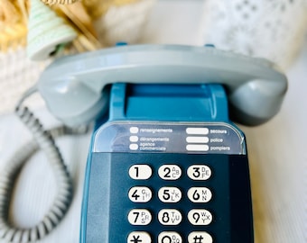 Vintage telefoon Socotel S63 blauwe knoppen