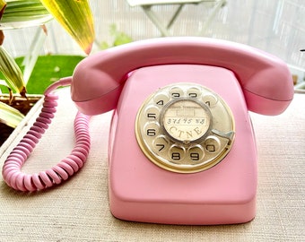 Téléphone Herald vintage peint en rose