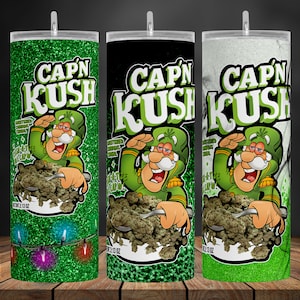 Peut inclure: Trois gobelets isolés verts, noirs et blancs avec un personnage de dessin animé et le texte "Cap'n Kush" et "Breakfast Cereal" imprimé dessus.