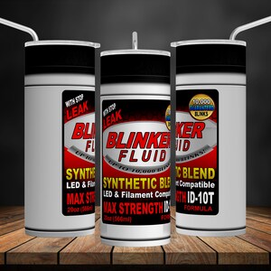 May include: Three white insulated tumblers with black lids and straws. Each tumbler features a label for "Blinker Fluid" with the text "With Stop Leak", "Up to 10,000 Blinks", and "Synthetic Blend LED & Filament Compatible Max Strength ID-10T Formula".