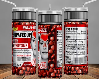 May include: A red and white tumbler with a graphic of a pill bottle labeled "Supafedup with Everyone" and a woman with a headache. The bottle lists the active ingredient as "Pseuperphedupofitol" and the purpose as "Brain Relief". The text on the bottle also includes "Maximum Strength", "Workplace Bullshit", "Sinus Congestion", and "Non-Drowsy".