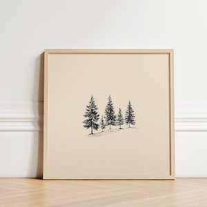 May include: A framed print of a minimalist black and white illustration of five pine trees against a cream background.