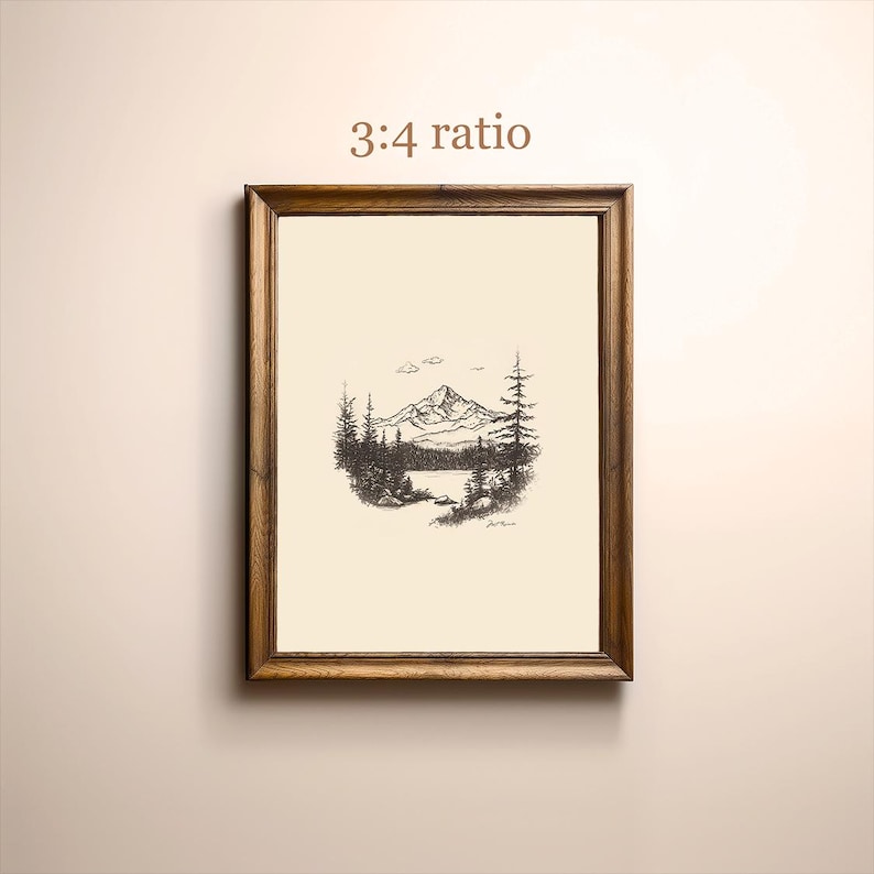 May include: A framed black and white line drawing of a mountain range with a lake in the foreground. The drawing is in a wooden frame with a 3:4 ratio.