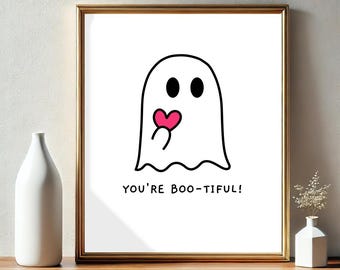May include: A white ghost with black eyes and a pink heart in its hand. The ghost is saying "You're Boo-tiful!"