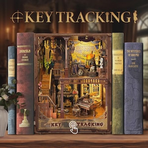 May include: A detailed wooden model of a haunted house, with a piano, staircase, and miniature furniture, is flanked by classic book spines. The text "KEY TRACKING" is displayed above and below the model, with book titles visible.