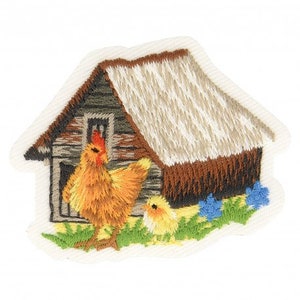 May include: Embroidered patch depicting a hen and chick beside a rustic house. The hen is orange and yellow with a red comb, the chick is yellow, and the house has a brown roof and walls. Green grass and blue flowers are at the base.