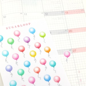 May include: A sheet of colorful balloon stickers with the text "SUGARLOOP" at the top. The balloons are in various colors, including pink, blue, green, yellow, and purple.