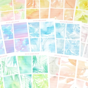 May include: A set of 10 watercolor planner stickers featuring various floral and foliage designs in pastel colors. The stickers are arranged in a grid pattern and have a white background.