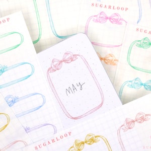 May include: A set of printable planner stickers with a watercolour ribbon bow design. The stickers feature the word "Sugarloop" and the month "May".