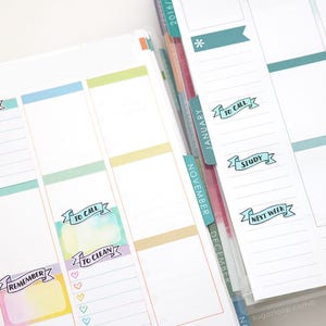 May include: A close-up of a planner with colorful stickers. The stickers have text that says "To Do", "To Call", "Remember", "To Clean", "Study", and "Next Week".
