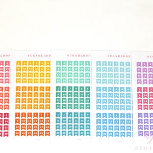 May include: Five sheets of planner stickers with the word "SUGARLOOP" printed at the top and bottom. Each sheet features a grid of numbered flags in shades of pink, orange, yellow, teal, blue, and purple, ideal for calendar organisation.