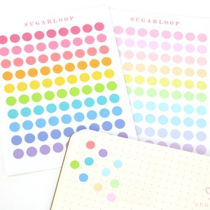 May include: Two sheets of rainbow coloured dot stickers with the text "SUGARLOOP" at the top of each sheet.