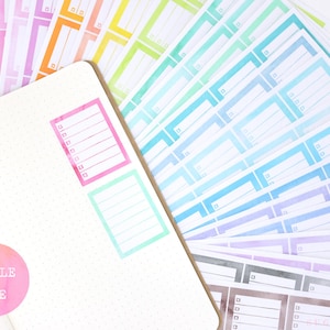 May include: A set of colorful watercolor planner stickers with a variety of rectangular shapes and lines. The stickers are arranged in a fan shape and include the text "BUNDLE & SAVE".