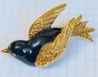 Vintage Joan Rivers Classics Collection Black Enamel & Antiqued Gold Plated Dove Pin featuring a Red Swarovski Crystal Eye