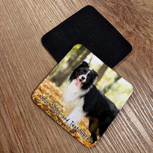 May include: Square coaster with a black, textured underside and a printed top showing a black and white dog in a woodland scene. The text "Your Photo and Text Here" is printed on the coaster.