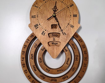 May include: Wooden wall clock with a unique design. The clock features Roman numerals, a date display, and rotating rings for the month and day. The clock is made of light brown wood and has a modern aesthetic.