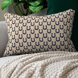 Navy horseshoe lumbar pillow on beige sofa, western decor throw pillow, farmhouse living room accent cushion cover