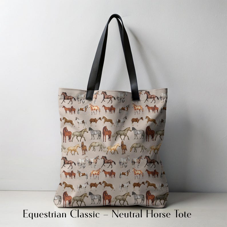 Minimalist display of horse-themed tote bag in a neutral palette. Features multiple hand-illustrated horse breeds and strong black handles. A classic, durable option for equestrians, barn girls, and country lovers. Makes a timeless gift for riders who value understated style, practicality, and horse-themed accessories for daily life.