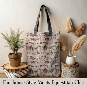 Farmhouse-themed flat lay featuring horse lover tote bag with boho accents, pampas grass, and cozy textures. This tote blends rustic charm and modern equestrian flair—ideal for barn errands, country living, and Western gifting. A beautiful, durable bag made for horse girls who adore earthy tones and farmhouse-inspired style.