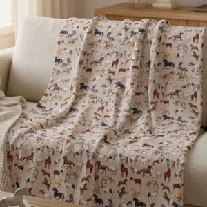 horse throw blanket on sofa, equestrian home decor blanket, cozy farmhouse horse blanket for living room