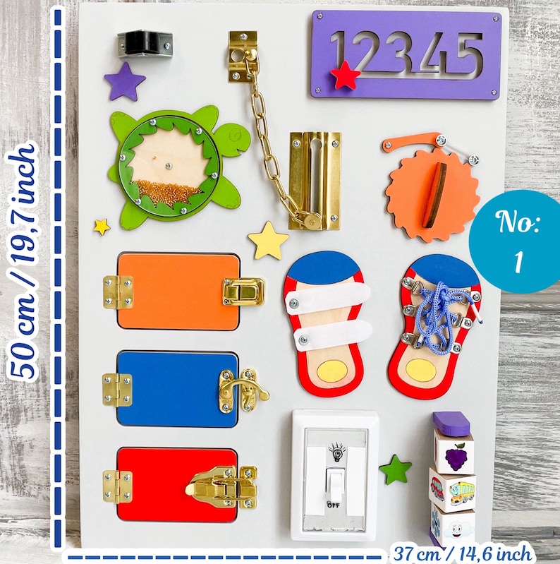 May include: A wooden busy board, 19.7 inches tall and 14.6 inches wide, features various interactive elements. It includes latches, a chain, a light switch, numbers, and a turtle-shaped element. The board is designed for sensory and fine motor skill development.