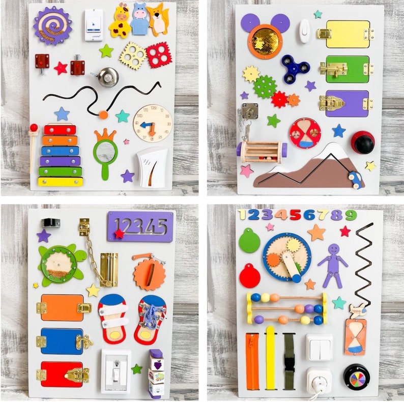 May include: Four white wooden busy boards with various interactive elements. Each board features colorful shapes, latches, gears, and other sensory components. One board includes a xylophone, another a clock, and others have numbers and letters.