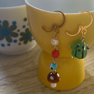 Frog and Mushroom Evil Eye Mismatched Earrings image 1