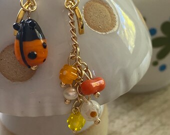 Mismatched Orange Ladybug Earrings