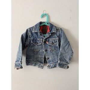 Chaqueta vaquera vintage Little Levis con etiqueta naranja y forro a cuadros de búfalo, talla 6. LEER imagen 1