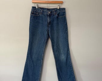 Vintage Y2K Levis 518 Denim Jeans 11 Jr. Super Low Boot Cut Medium Wash Womens