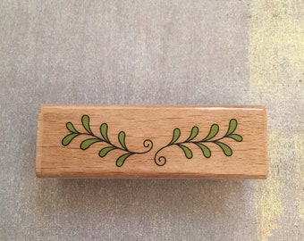 Wooden backed rubber stamp
