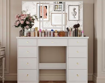 Beautiful makeup table has hidden storage behind both mirrors, a wide desktop and 9 larger drawers