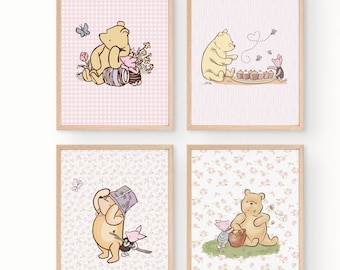 May include: Four framed prints featuring Winnie the Pooh and friends. Each print has a different background pattern: pink gingham, pink stripes, and floral patterns. The illustrations depict Pooh with honey, Piglet, and butterflies.