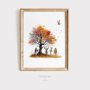 May include: A framed art print featuring a colorful tree with autumn foliage. The artwork depicts characters from The Wizard of Oz, including Dorothy, the Scarecrow, Tin Man, and the Cowardly Lion. A winged creature flies above the tree. The text "Storybook Hill" is at the bottom.