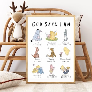 May include: A framed print with the text "GOD SAYS I AM" and illustrations of Winnie the Pooh characters. Each character is associated with a positive affirmation and a Bible verse. The frame is a light wood color.