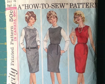 May include: Vintage Simplicity sewing pattern featuring three dress designs. The pattern cover shows illustrations of the dresses in different colors and styles. The text includes "A How-To-Sew Pattern" and "Simple to Make."