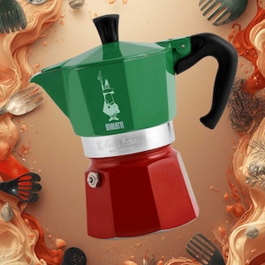 May include: A red and green stovetop espresso maker with a black handle and top. The green top features a white graphic and the brand name "Bialetti". The espresso maker is made in Italy.