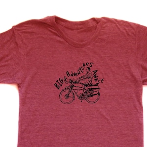 big adventures (pee wee) unisex t-shirt, big adventures await t-shirt, men&#39;s pee wee tshirt, fun bike tee, funny men or women&#39;s gift, 80&#39;s t