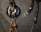 Vitality - Sterling Silver Wire Wrap Art Onyx Donut Pendant on Satin cord