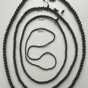 Ebony mala in 3mm, 6mm, 8mm and 10mm bead size. Made From Original blace Ebony wood aka Karungali Kattai, known Indian name for Prayers.