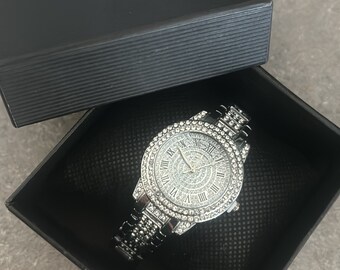Iced out nixon watch deals