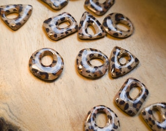 Multi-shaped tassels with a marbled and leopard print effect – handmade polymer clay – to be paired with hoop earrings