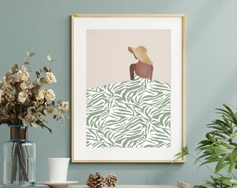 Eine Frau in einem grünen Zebra-Kleid und mit einem breitkrempigen Hut. - Premium Matte Papier Poster 200 g/m²